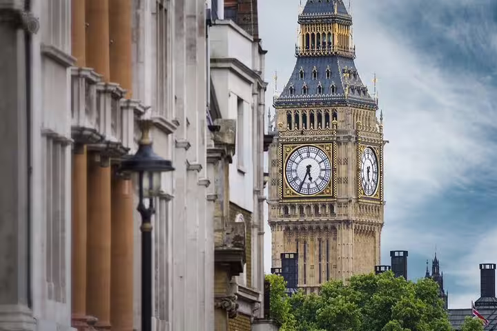 Big Ben clock tower view between Westminster buildings on a 2-hour private London tour with a local guide