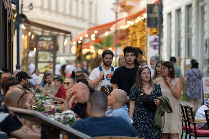 Bustling Bilbao old town street with pintxos terraces, a lively checkpoint on the Bilbao e-scavenger hunt