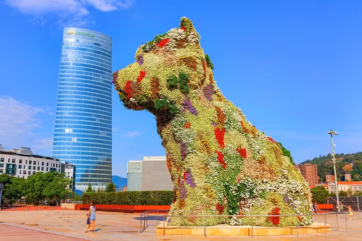 Admire Bilbao's famous Puppy sculpture and modern skyline on the Santander day tour.