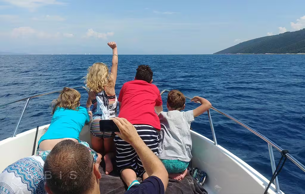 Guests on a private speedboat cruising to Blue Lagoon and Šolta islands, Split boat tour on Adriatic Sea