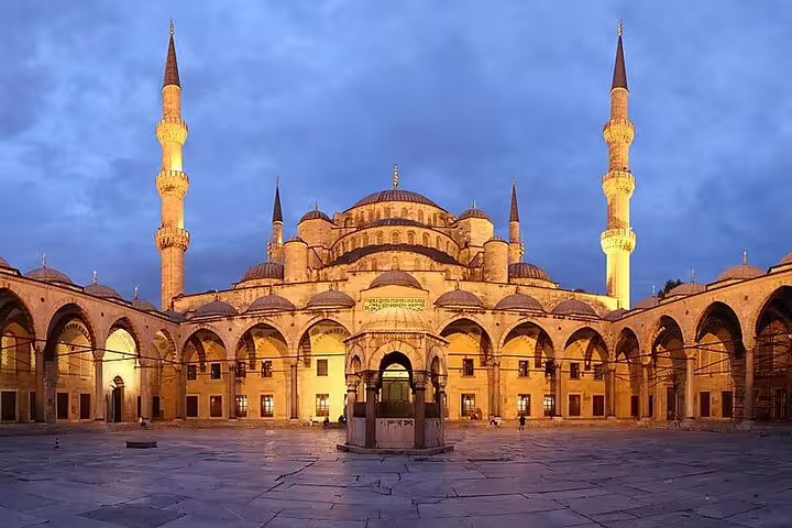 Discover the stunning architecture of the Blue Mosque at dusk on a private Istanbul tour from Galata Port.