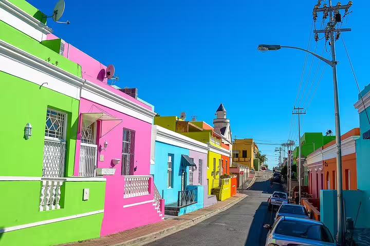 Vibrant, colorful houses line the historic streets of Bo-Kaap, showcasing Cape Town's rich cultural heritage.