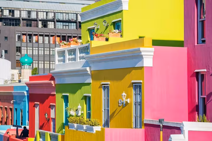 Colorful Bo-Kaap houses in Cape Town, showcasing vibrant architecture on a Table Mountain, Boulder Beach, and Cape Point tour.