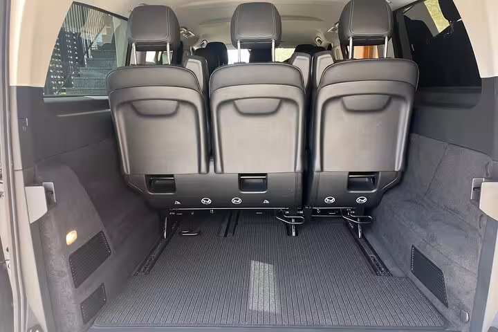 Spacious and luxurious minivan interior for private transfer from Bologna Airport to Florence.