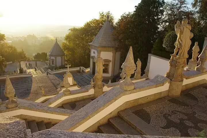 Bom Jesus do Monte baroque stairway and statues at sunset, Braga stop on Porto to Braga and Guimarães tour