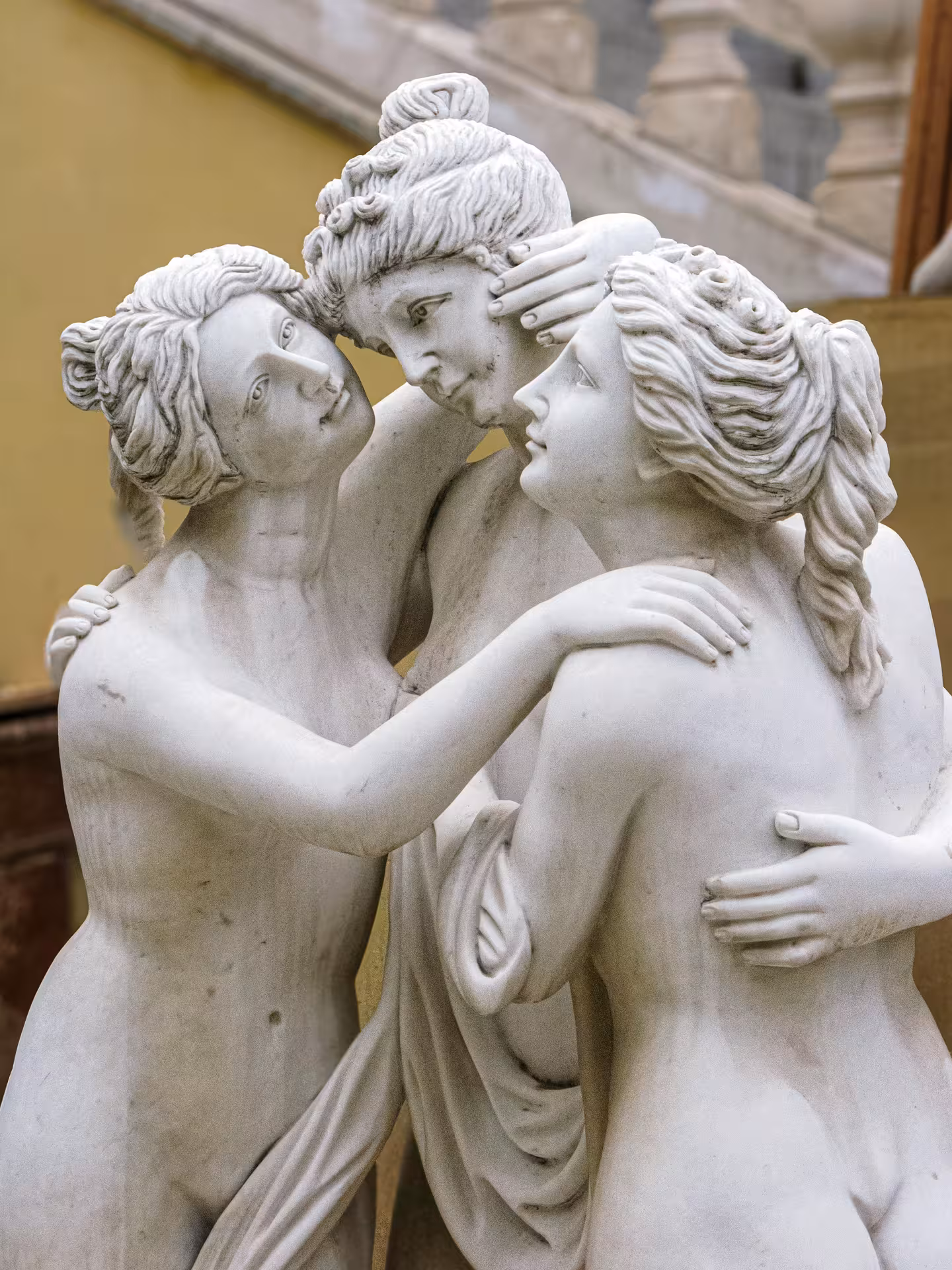 Elegant marble statue of three Graces embracing, highlighting the neoclassical art on the Borghese Gallery Combo Tour.