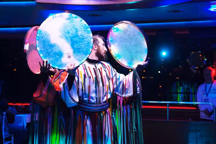 Traditional Turkish drum show on Bosphorus dinner cruise in Istanbul, live entertainment with private table seating