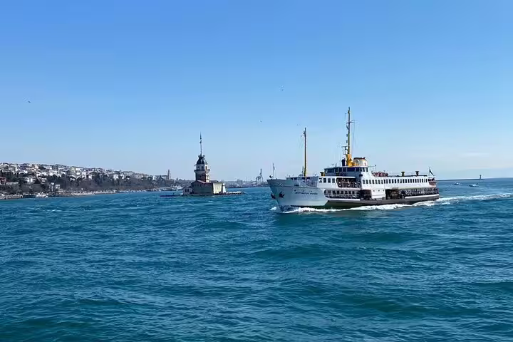 Ferry cruising the Bosphorus with Maiden’s Tower, Istanbul highlight on a 7-day Western Turkey guided tour