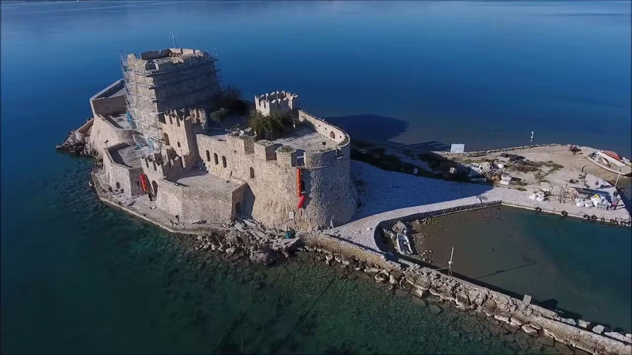 Drone view of Bourtzi Castle in Nafplio harbor, a highlight of private Athens to Argolis day tour