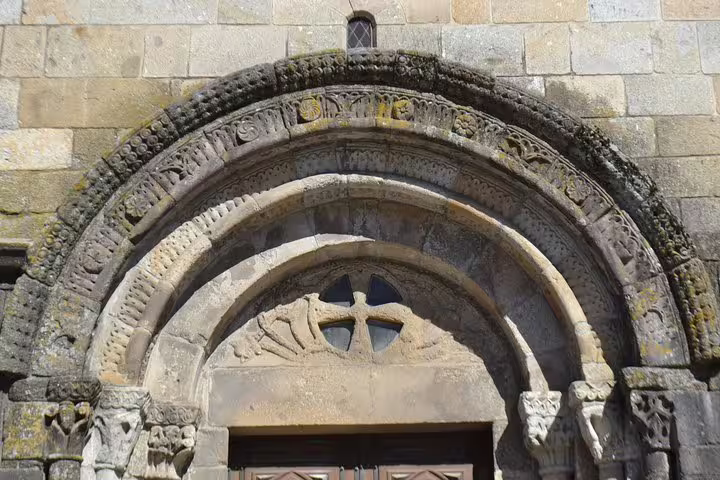 Intricate Romanesque arch detail at Braga's historic cathedral entrance on Braga half-day private tour from Porto.