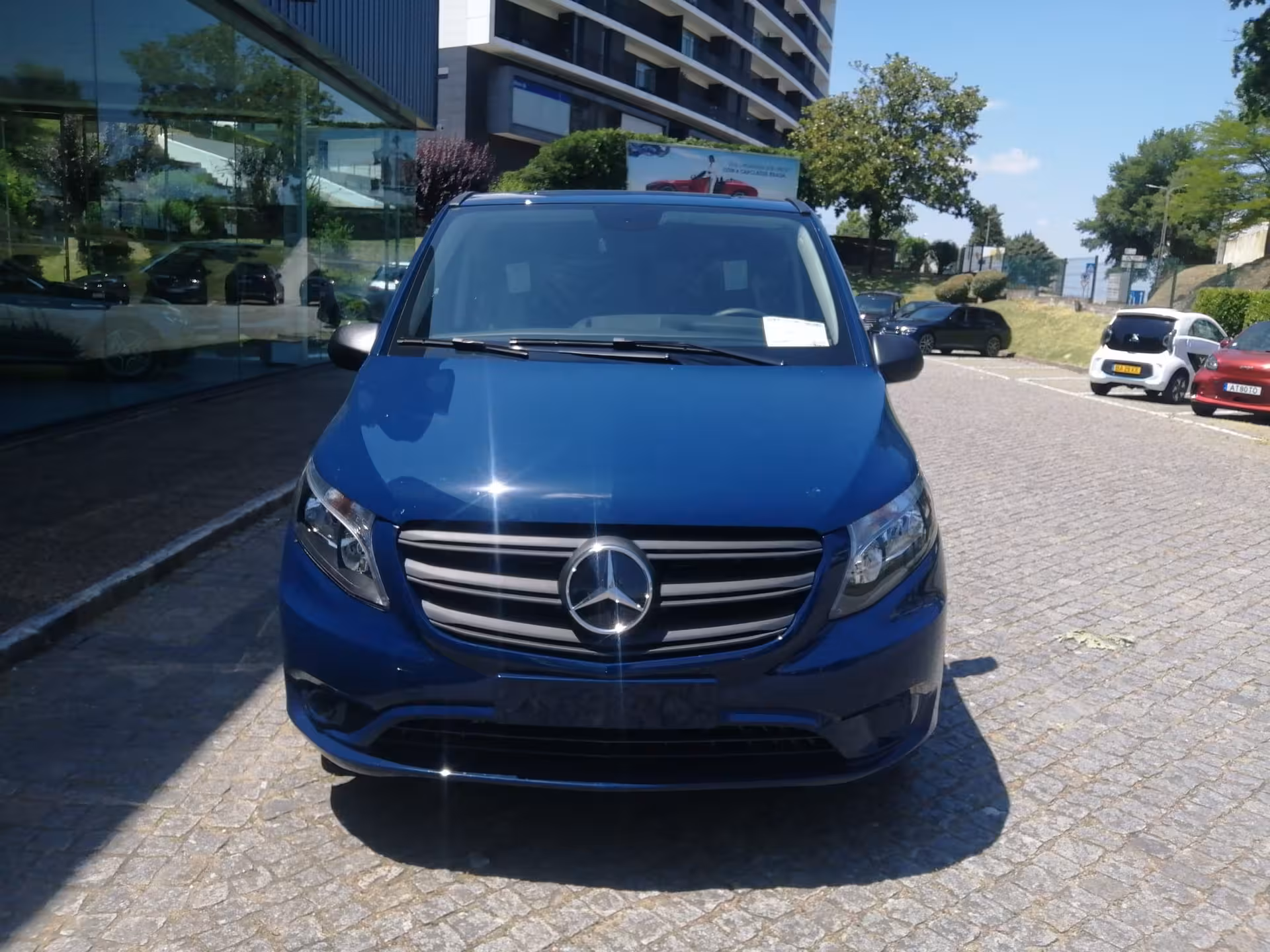 Blue Mercedes minivan for Braga to Porto Airport private transfer, comfortable door-to-door airport taxi service