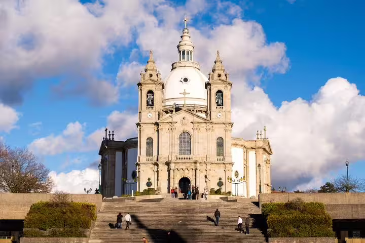 Majestic sanctuary in Braga with blue skies, featured in Minho Tour Private Braga and Guimarães Full Day.