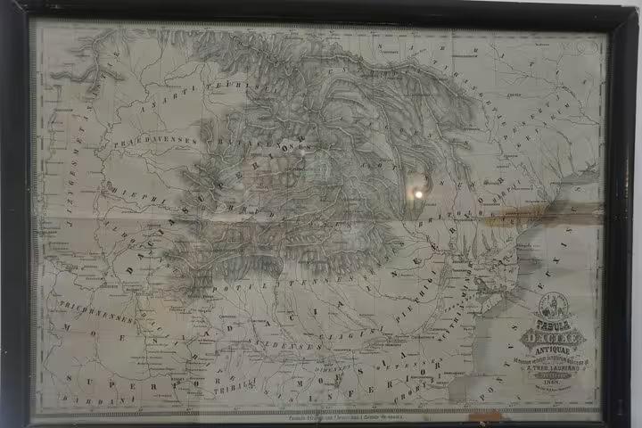 Antique map of Dacia region displayed in black frame, historical cartography from 1865