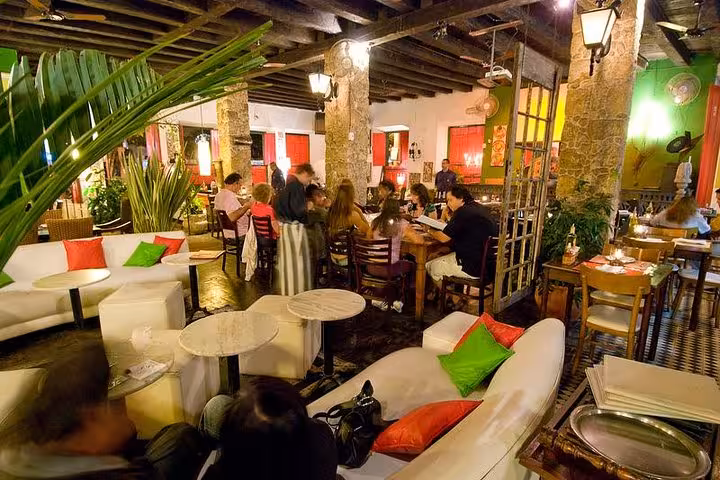 Cozy Brazilian diner with colorful decor and live music vibe, perfect for enjoying a caipirinha evening.