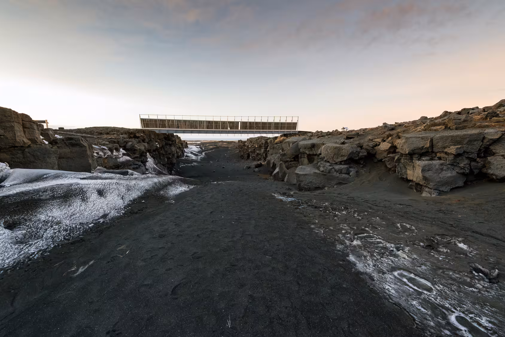 Dramatic view of the Bridge Between Continents on Reykjanes Peninsula, showcasing Iceland's unique geological features.