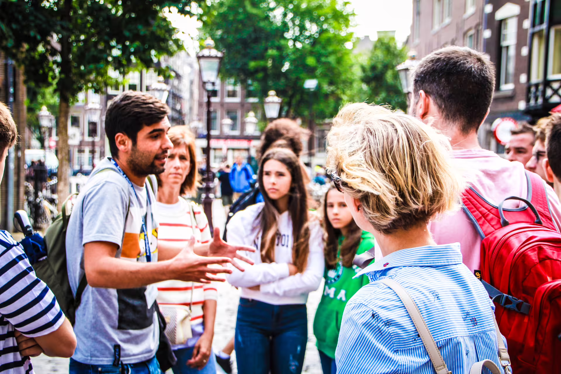A guide leads a group on a captivating Bruges private walking tour, exploring the historical charm of the pearl of Flanders.