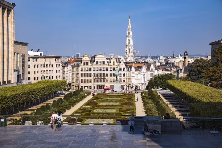 Mont des Arts garden view toward Brussels Town Hall spire on a private half-day Brussels sightseeing tour