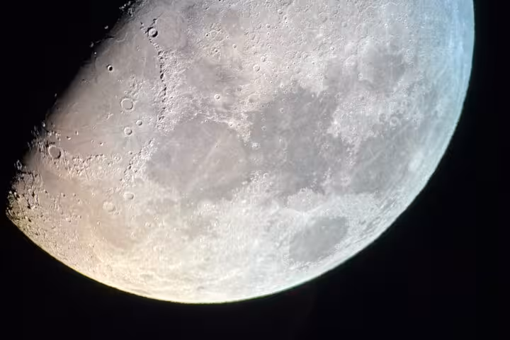 Close-up view of the moon through a telescope on a Bryce Canyon stargazing adventure in Utah dark skies
