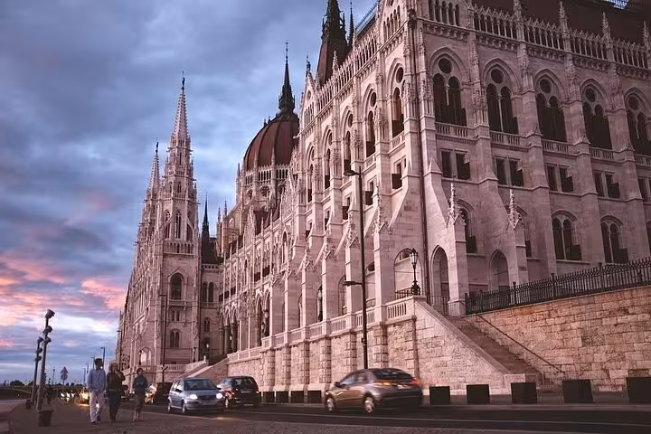 Hungarian Parliament Building in Budapest at dusk, scenic stop on Budapest and Bratislava private day tour