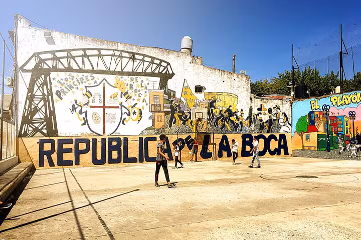 Colorful Republica de La Boca mural and street art stop on a Buenos Aires La Boca tour with a local