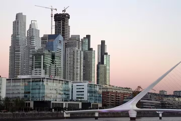 Puerto Madero skyline and Puente de la Mujer at sunset on a Buenos Aires full day sightseeing tour