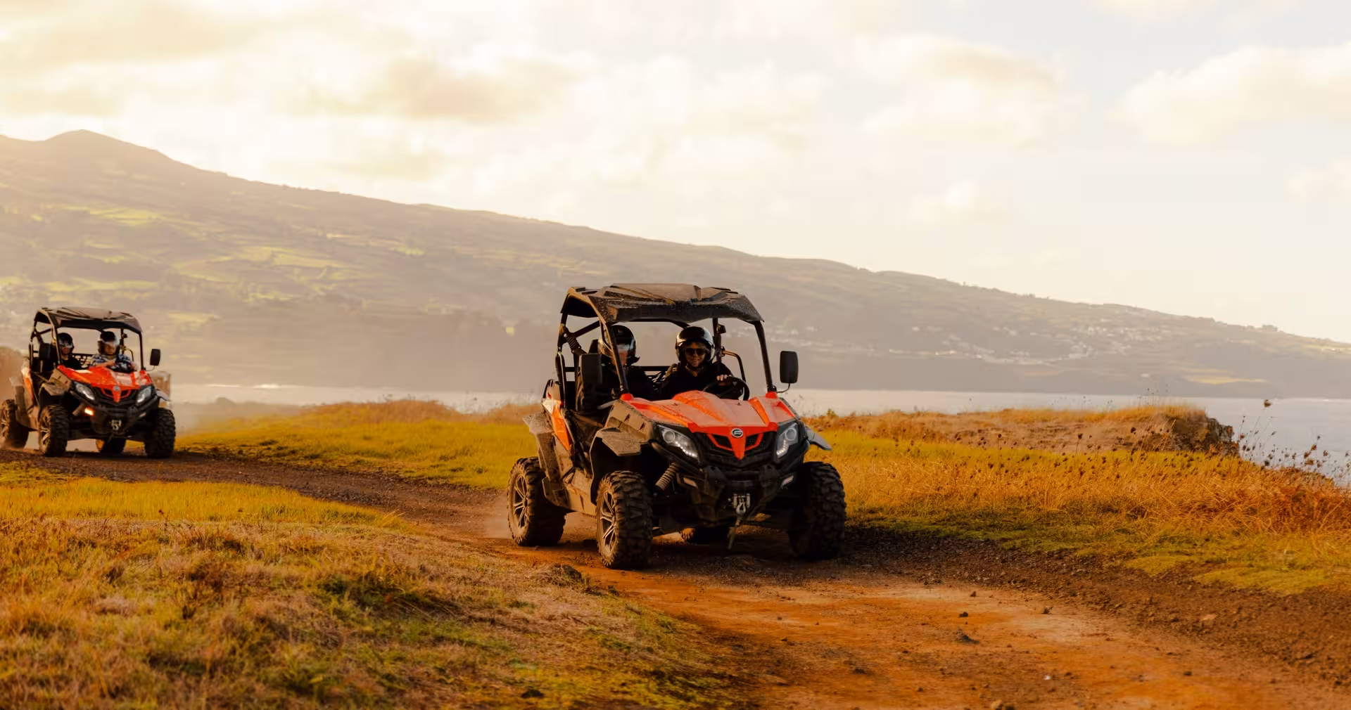 Two buggies on dirt trail by the coast near Sete Cidades, São Miguel half-day off-road buggy tour