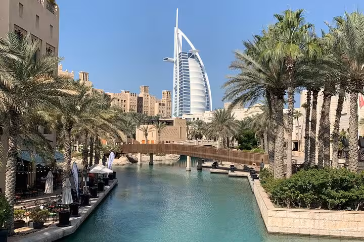 Burj Al Arab view over Madinat Jumeirah canal on Dubai city tour with pickup and drop off to Fujairah