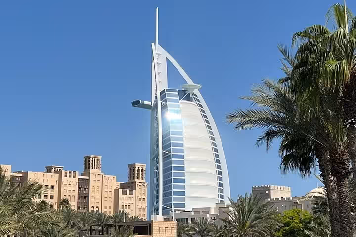Burj Al Arab photo stop on private Dubai tour, iconic 7-star hotel with palm trees, Burj Khalifa ticket included
