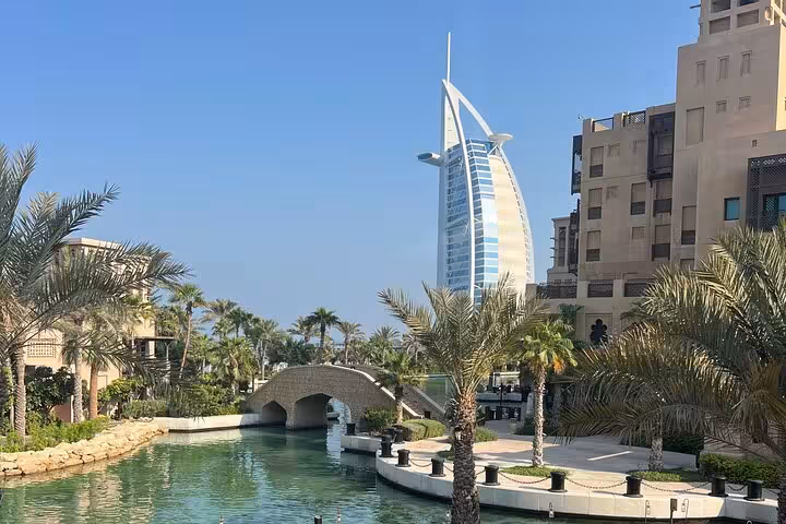 Burj Al Arab view from Madinat Jumeirah canal and bridge, featured on Dubai city tour from Ras Al Khaimah