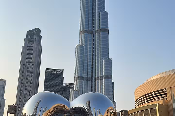 Burj Khalifa rising over Downtown Dubai on private city tour with Burj Khalifa ticket and multilingual guide