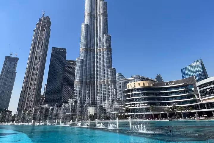 Burj Khalifa and Dubai Fountain views at Downtown Dubai stop on full-day Dubai city tour from Ras Al Khaimah
