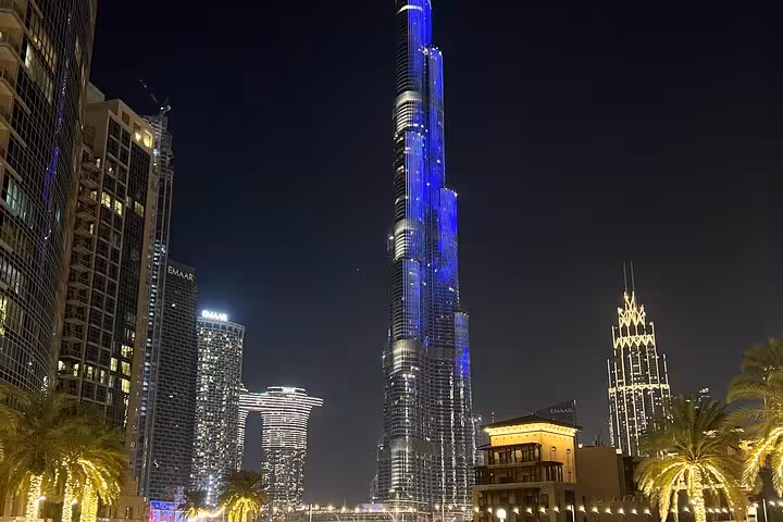 Burj Khalifa illuminated at night in Downtown Dubai, highlight of a private Dubai by night tour with fountain show