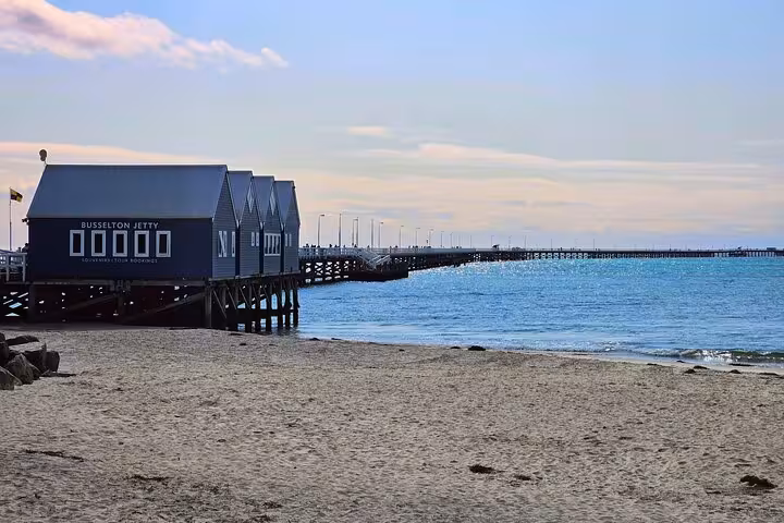 Scenic view of Busselton Jetty extending into the ocean, a highlight of the 2 Day Tour from Ngilgi Cave to Valley of the Giants.