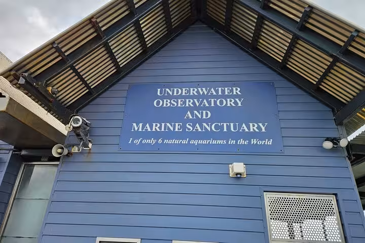 Underwater Observatory and Marine Sanctuary sign at Busselton Jetty, featured on the 2 Day Tour itinerary.