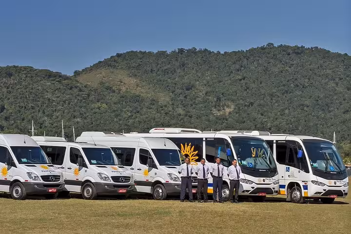 Fleet of Paraty Tours buses and vans with professional drivers for Búzios to Rio de Janeiro transport.
