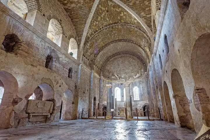 Interior of ancient Byzantine basilica ruins in Turkey, vaulted brick arches on 13-day private guided history tour