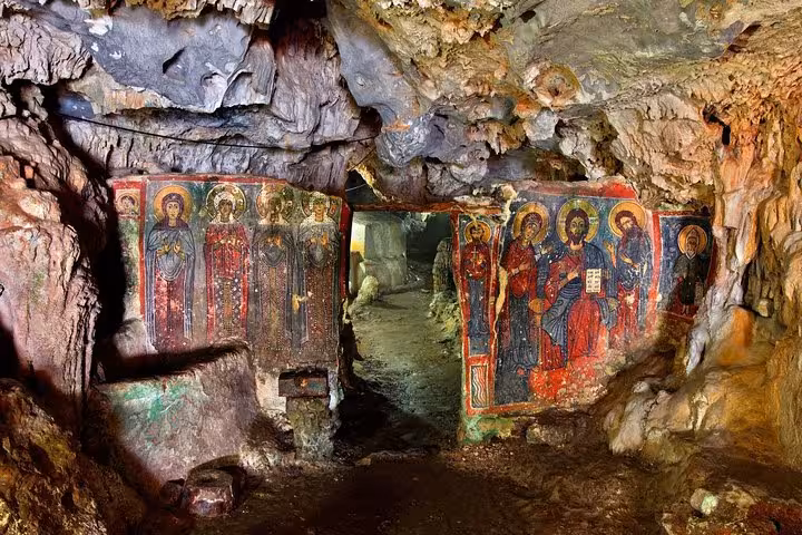 Byzantine frescoes inside a Cretan cave church, cultural stop on Elafonissi Beach from Rethimno tour