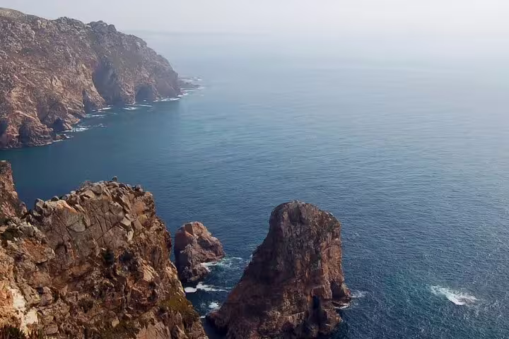 Scenic view of rugged cliffs and the Atlantic Ocean at Cabo da Roca, part of a full-day Sintra and Cascais tour.