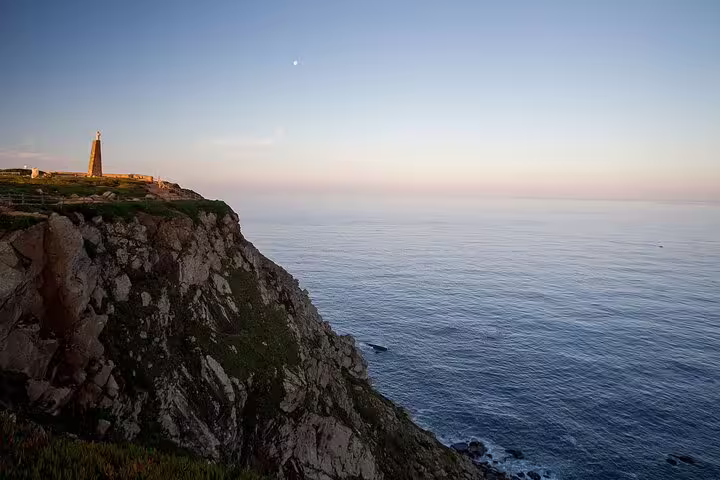 Scenic view of Cabo da Roca cliffs at sunset, perfect for Lisbon's Sintra and Cascais guided day tours.