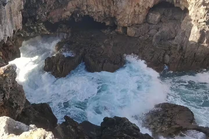 Dramatic coastal cliffs and crashing waves at Cabo da Roca, a highlight of the Sintra and Cascais day trip from Lisbon.