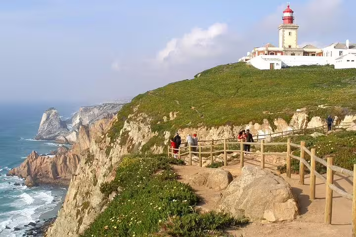 Scenic view of Cabo da Roca lighthouse and cliffs on a private Sintra tour, offering breathtaking coastal landscapes.
