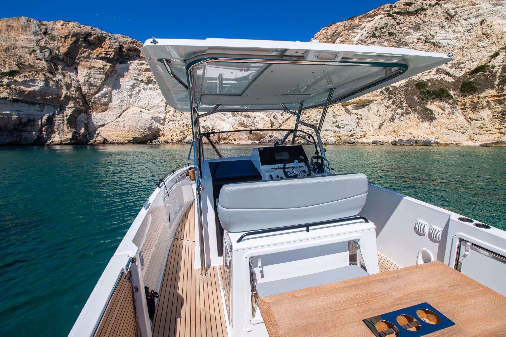 Experience a Cagliari boat tour with stunning views of Sardinia's rocky coastline and crystal-clear waters.