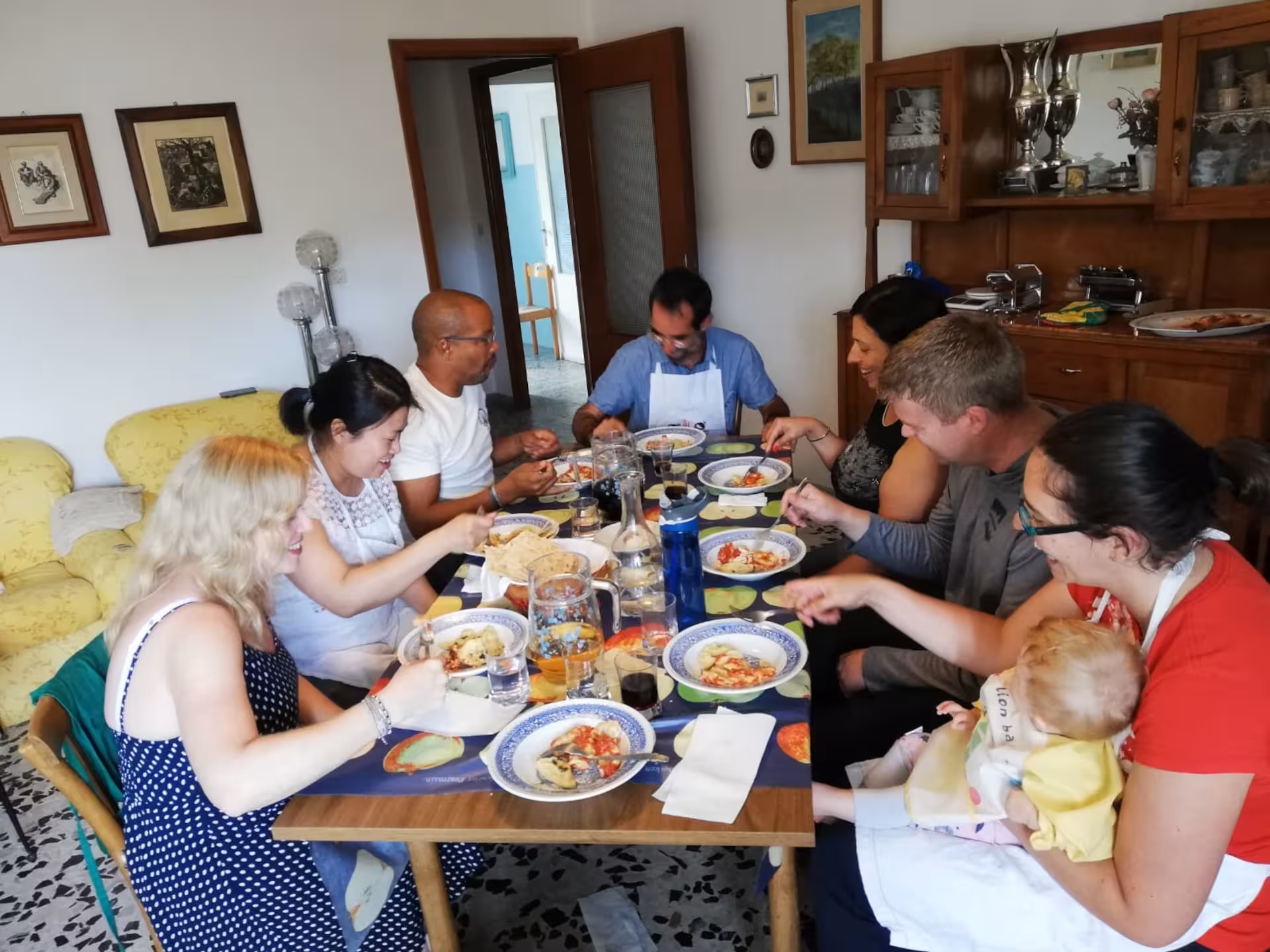 Participants enjoying a homemade culurgiones lunch in Cagliari after their cooking class.