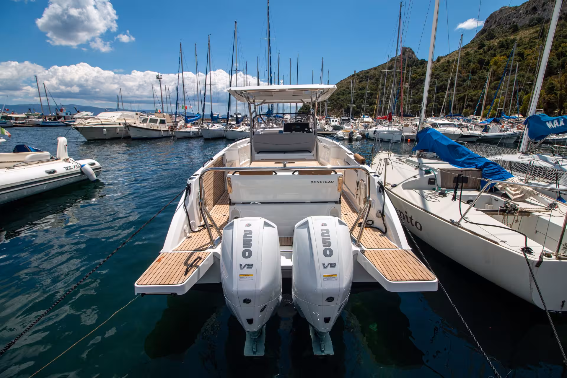 Luxury boat docked in Cagliari harbor, perfect for a 3-hour scenic tour along the Sardinian coastline.