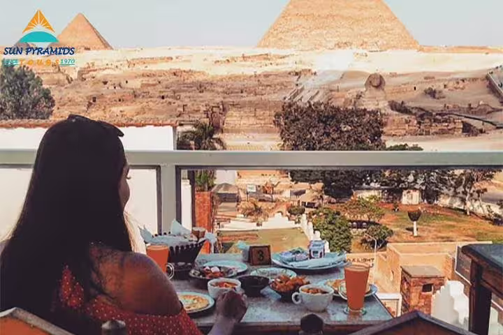 Breakfast with panoramic view of the Giza Pyramids, a highlight of the 5-day Cairo short break tour