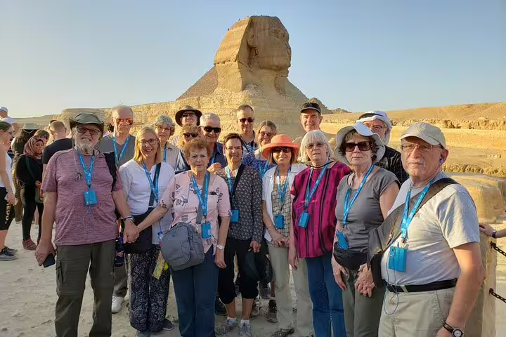Layover tour group at the Great Sphinx of Giza, easy Cairo Airport stopover trip with guide