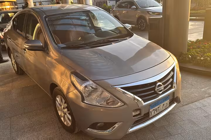 Comfortable sedan for private transfer from Cairo International Airport to Giza hotels, door-to-door service
