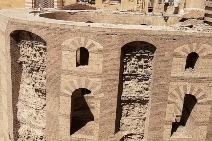 Ancient stone arches and brick walls inside Cairo Citadel, a highlight of the Old Cairo private tour