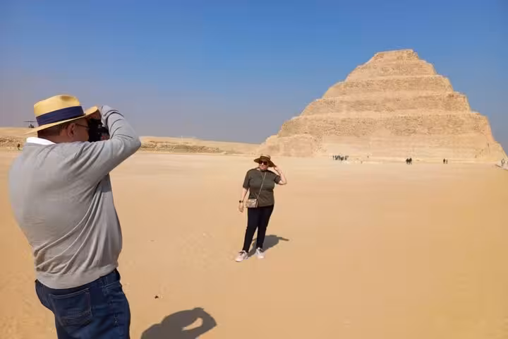 Tourist photo stop at Sakkara Step Pyramid on a Cairo day trip tour to Memphis and Sakkara with lunch