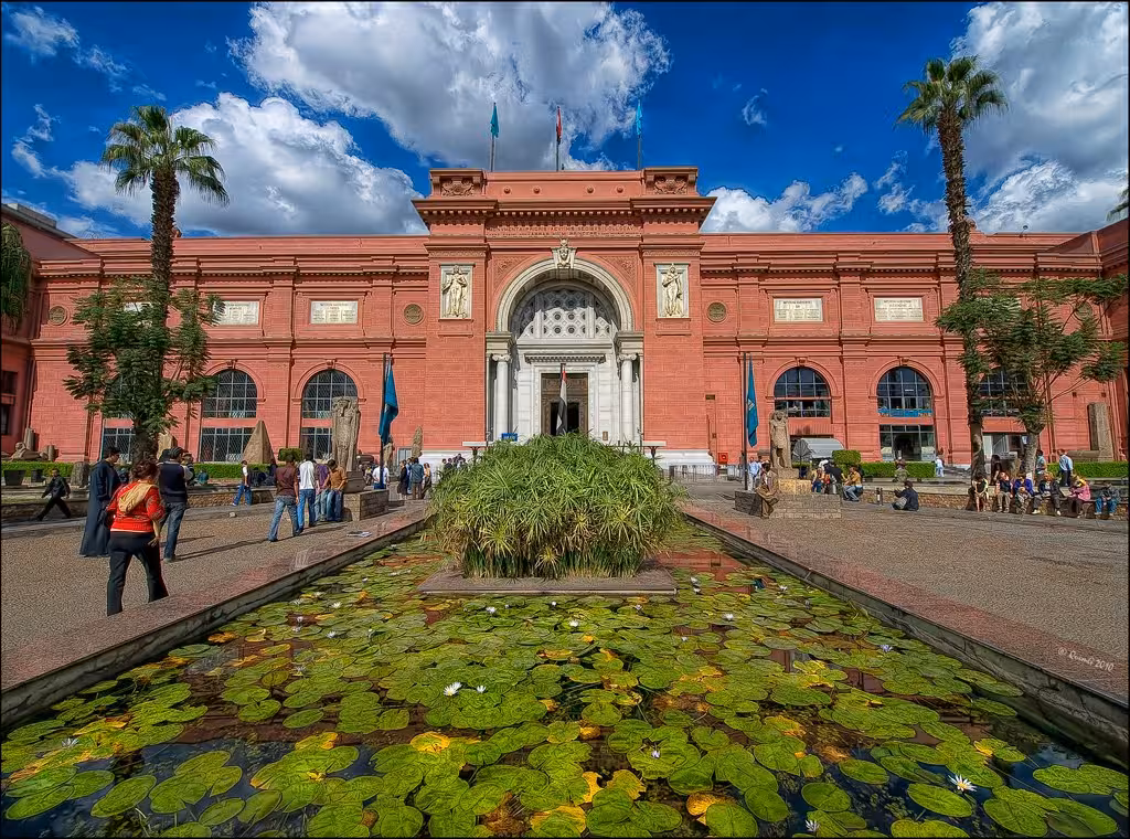 Cairo Egyptian Museum exterior with lily pond and palm trees, key landmark on an 8-hour private Cairo tour